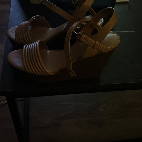 A pair of light brown wedges size 81/2. Perfect fitting strap around the ankle. - Picture 2 of 10